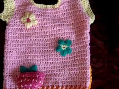 Crochet knit sweater pattern with strawberry pocket and flowers