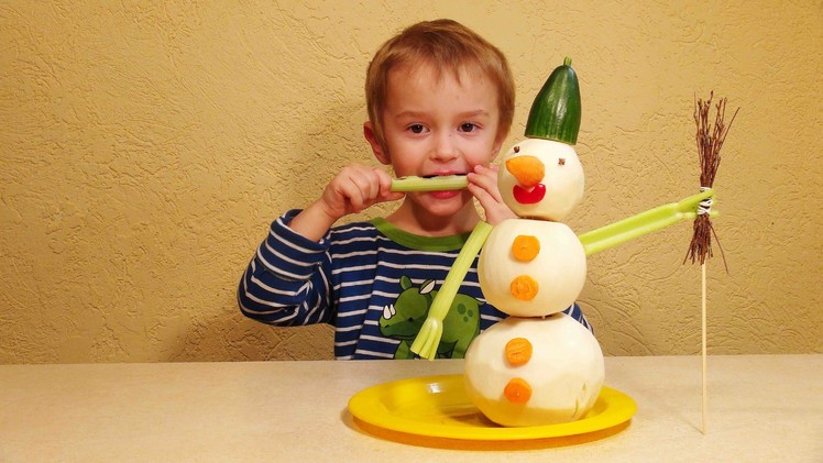 New Year DIY vegetables crafts for kids. Snowman of radish
