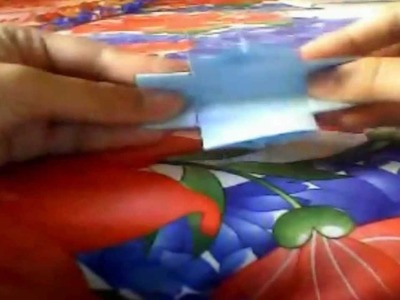 How To Fold An Origami T-Shirt.