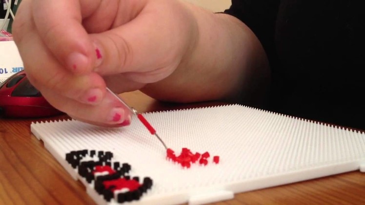 How to use a pin: Mini Hama Beads