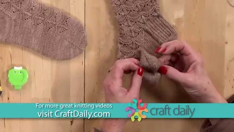 Knit Socks with a Rounded Chevron Stitch and Scalloped Edge