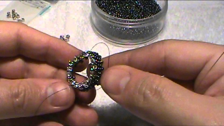 How to bead a bezel for a faceted stone that looks like a real gem setting.