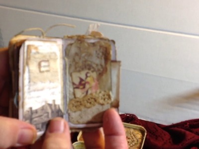 Tiny tin box with journal inside