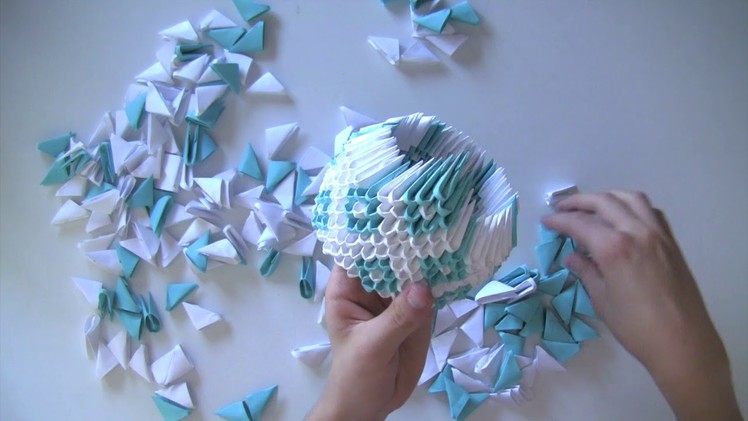 How to turn 1000 pieces of paper into a 3d origami swan - TIME LAPSE