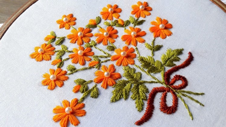 Hand Embroidery | satin stitch | flower design by nakshi katha.