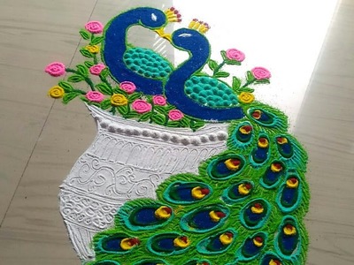 How to make beautiful couple peacock rangoli designs.peacock rangoli design easy by jyoti