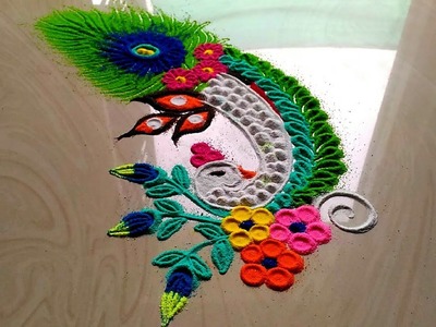 HOW TO MAKE peacock rangoli design,GANESH chathurthi spacial rangoli designs,Peacock feather rangoli