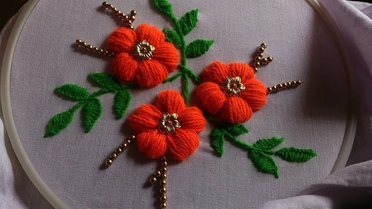 Hand embroidery. Flower embroidery design. Hand embroidery stitches. puffed satin stitch.