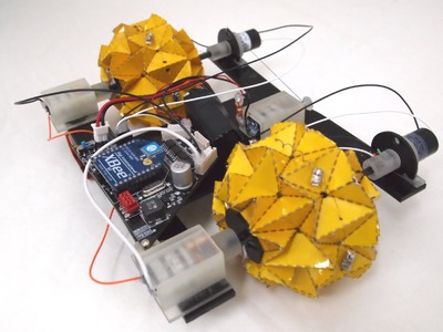 THE DEFORMABLE WHEEL ROBOT USING MAGIC-BALL ORIGAMI STRUCTURE
