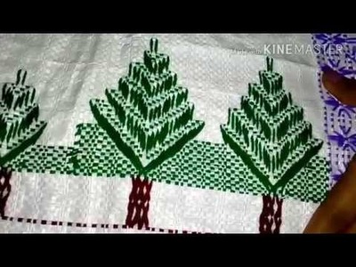 Pine tree on plastic sack. Hand embroidery on plastic Sack. Table mat stitch on plastic Sack.