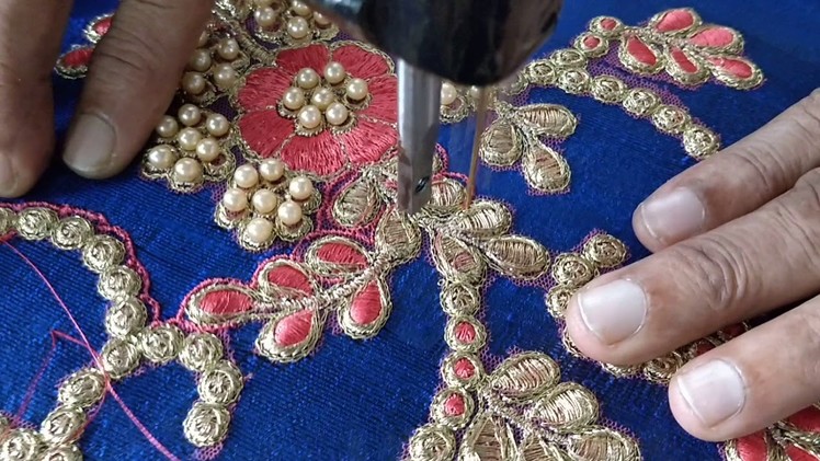 Matching blouse being made for a heavy applique work saree