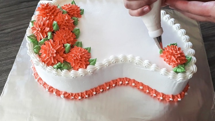 Paisley flower cake with whipped cream