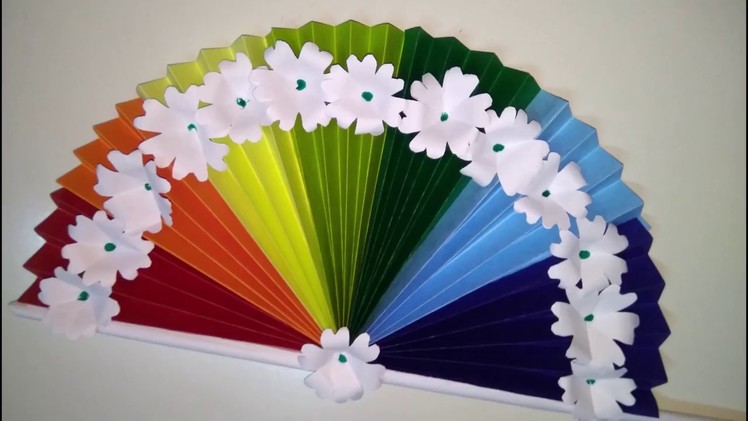 How to make paper rainbow hand Fan with rainbow color paper