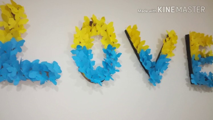 DIY room decor ideas with cardboard letters.DIY wall decoration of paper butterflies