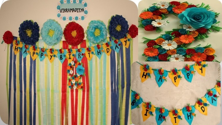 Simple second birthday decoration with paper.backdrop with paper flowers.mom and aditya