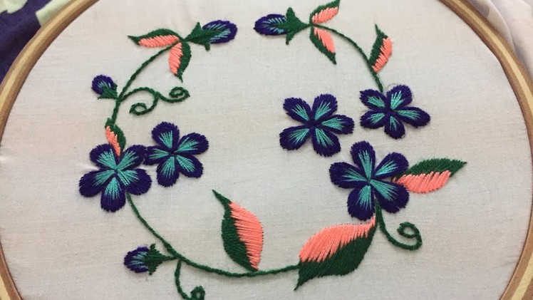 Hand embroidery flower design with satin and stem stitch by  nakshi design art