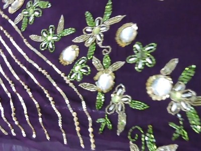 HAND EMBROIDERY WITH GLASS CUTS BEADS STITCHED BY THREAD.
