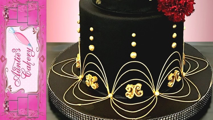 Gold & Black Wedding Cake - with Lambeth type piping.