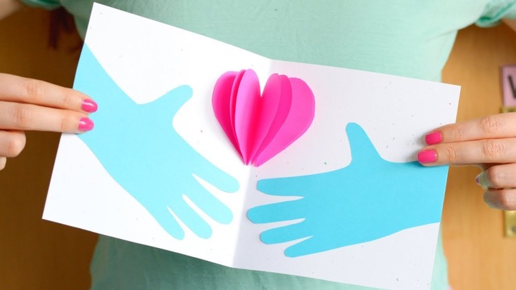 Hands Holding a Heart Mothers day Card