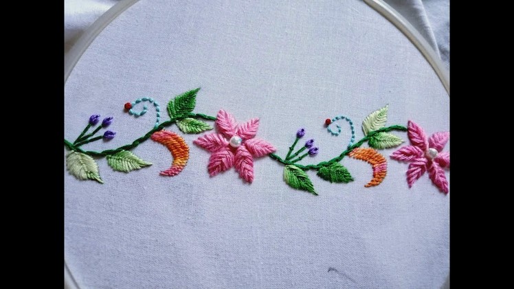 Hand embroidery.  Hula flower stitch. Border design.