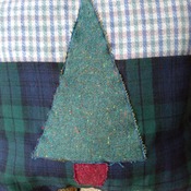 Pair of green check cushions with applique Christmas trees