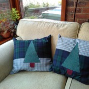Pair of green check cushions with applique Christmas trees