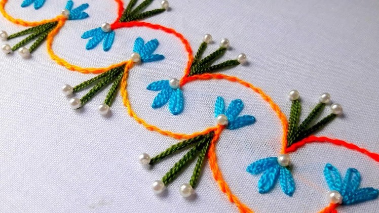 Hand Embroidery Design: lazy daisy with stiam stitch for border design.