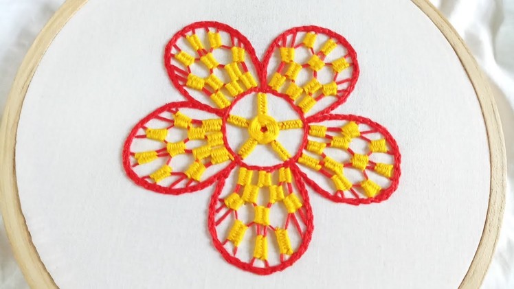 Hand embroidery of a flower with weaving bar stitch