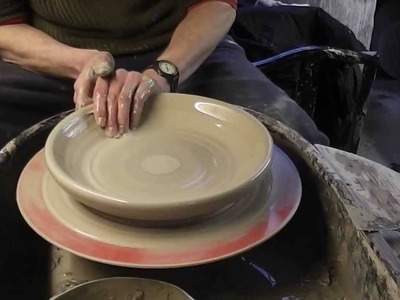 Making , Trimming & Decorating a large pottery plate on the wheel