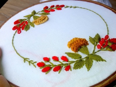 Hand embroidery : Embroidery for cushion covers design .