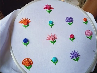 Hand embroidery.Raised cross stitch flower.Hand embroidery all over design for shirts and frocks.