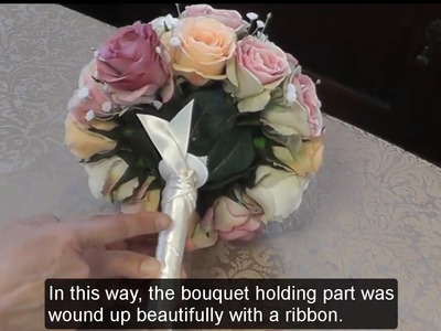 #18 Wrap a ribbon around the handle part of the bouquet holder