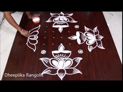 Karthika pournami special lotus deepam rangoli design with 9x3x3 dots * easy rangoli