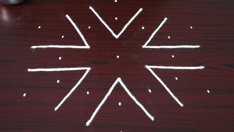 Latest muggulu rangoli designs with 7 dots - small kolam designs - simple rangoli - muggulu