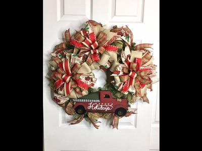 Learn how to make a Red Truck Wreath with a Pine Base.