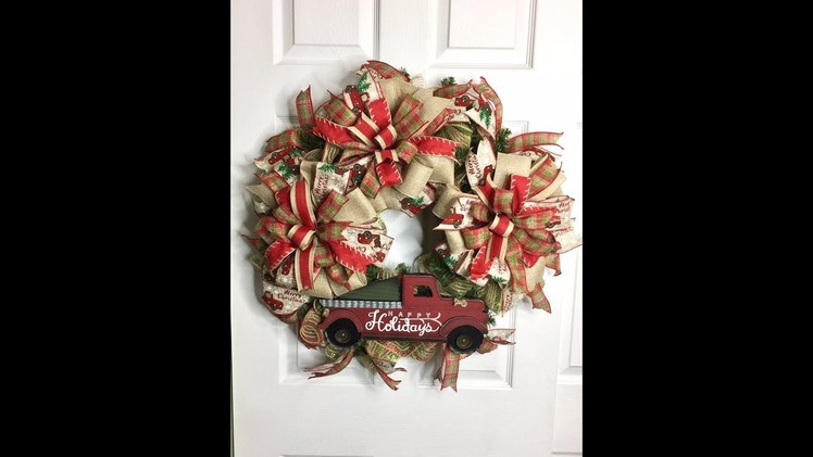 Learn how to make a Red Truck Wreath with a Pine Base.