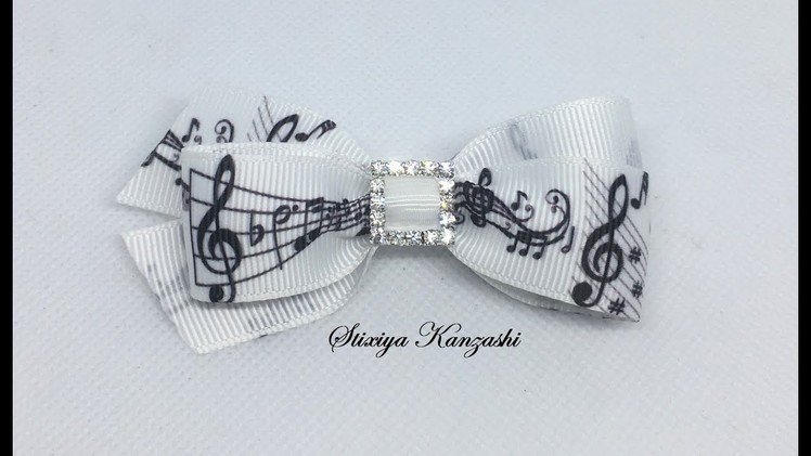 Decoration on a hairpin Kanzashi. Bow with notes. Unusual bow for 5 minutes