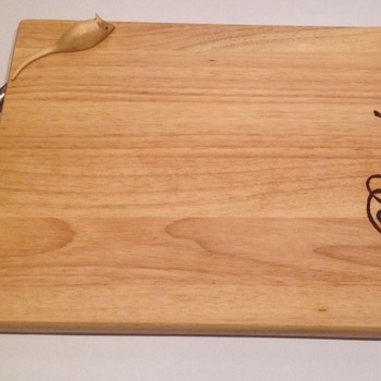Wooden Bread Board featuring a tiny mouse.