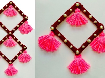 DIY NEW WALL HANGING TORAN IDEA.BEST OUT OF WASTE.ICE CREAM STICKS AND WOOL.NEW DESIGN