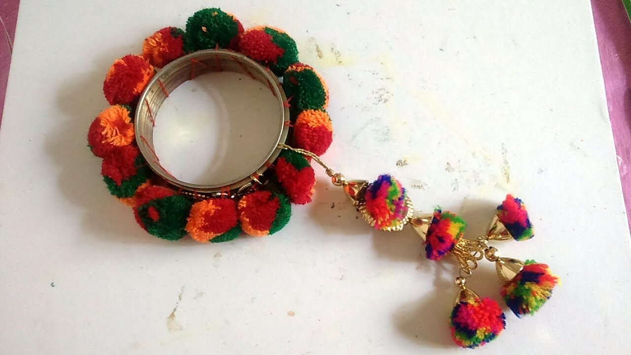 How to make pom pom lumba rakhi at home||Handmade rakhi|Navratri special pom pom bangle