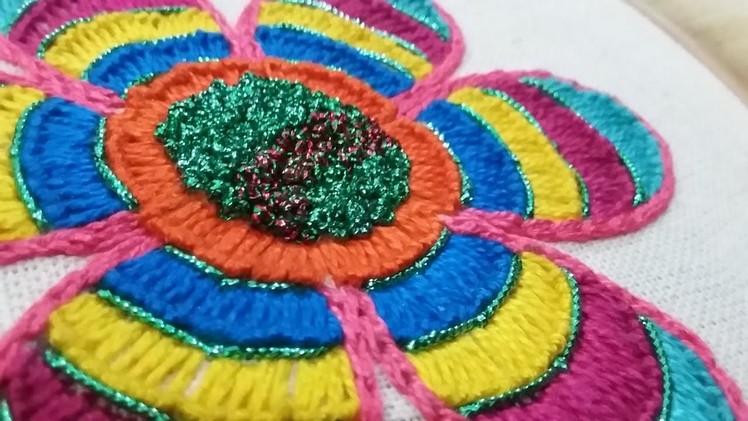 Hand embroidery of a multicolor flower