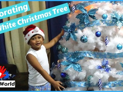 Kid Decorating a White Christmas Tree in Elee's World