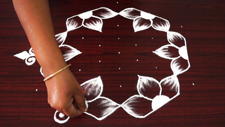 Beautiful simple rangoli designs | flower kolam designs with 9x5 dots | traditional muggulu