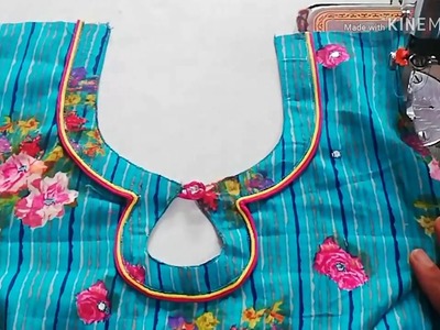 Very beautiful and creative double piping neckline design.double piping neck design