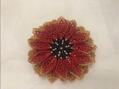 DIY tutorial on how to make this beaded flower.brooch