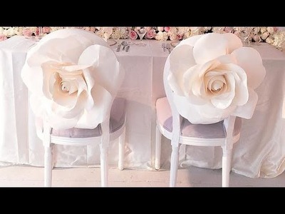 DIY large paper flower decoration on chair. chair decoration. chair sash. wedding reception