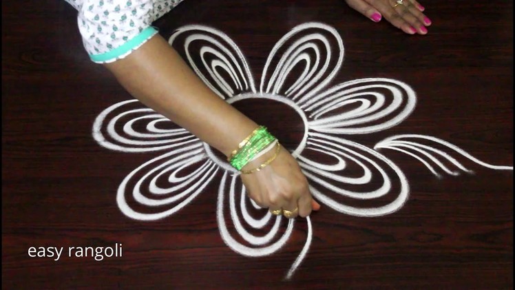 Cute easy rangoli kolam designs by Suneetha || beginners free hand muggulu || creative arts