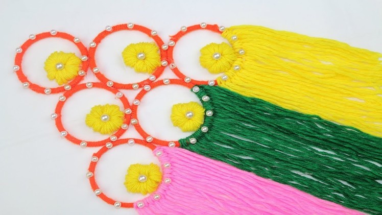 Woolen Craft Idea || How to Make Door Hanging Toran Using Woolen - DIY arts and crafts - Reuse ideas
