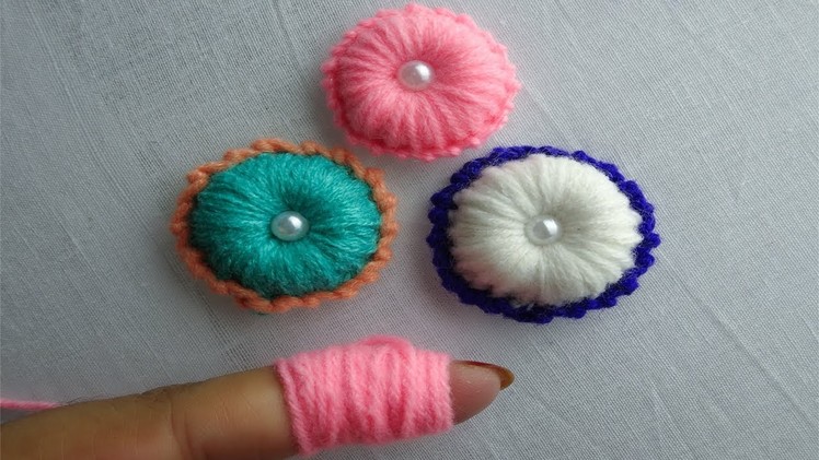 Hand Embroidery making button flower with wool yarn