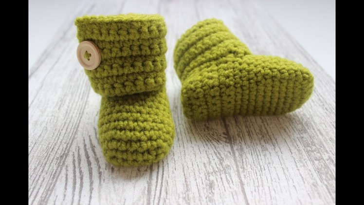 Crochet baby booties with button